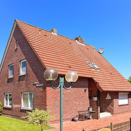 Ferienwohnungen Im Haus Waterkant Neuharlingersiel Esterno foto