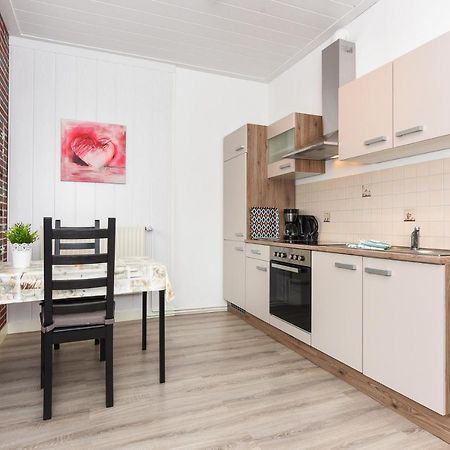 Ferienwohnungen Im Haus Waterkant Neuharlingersiel Esterno foto