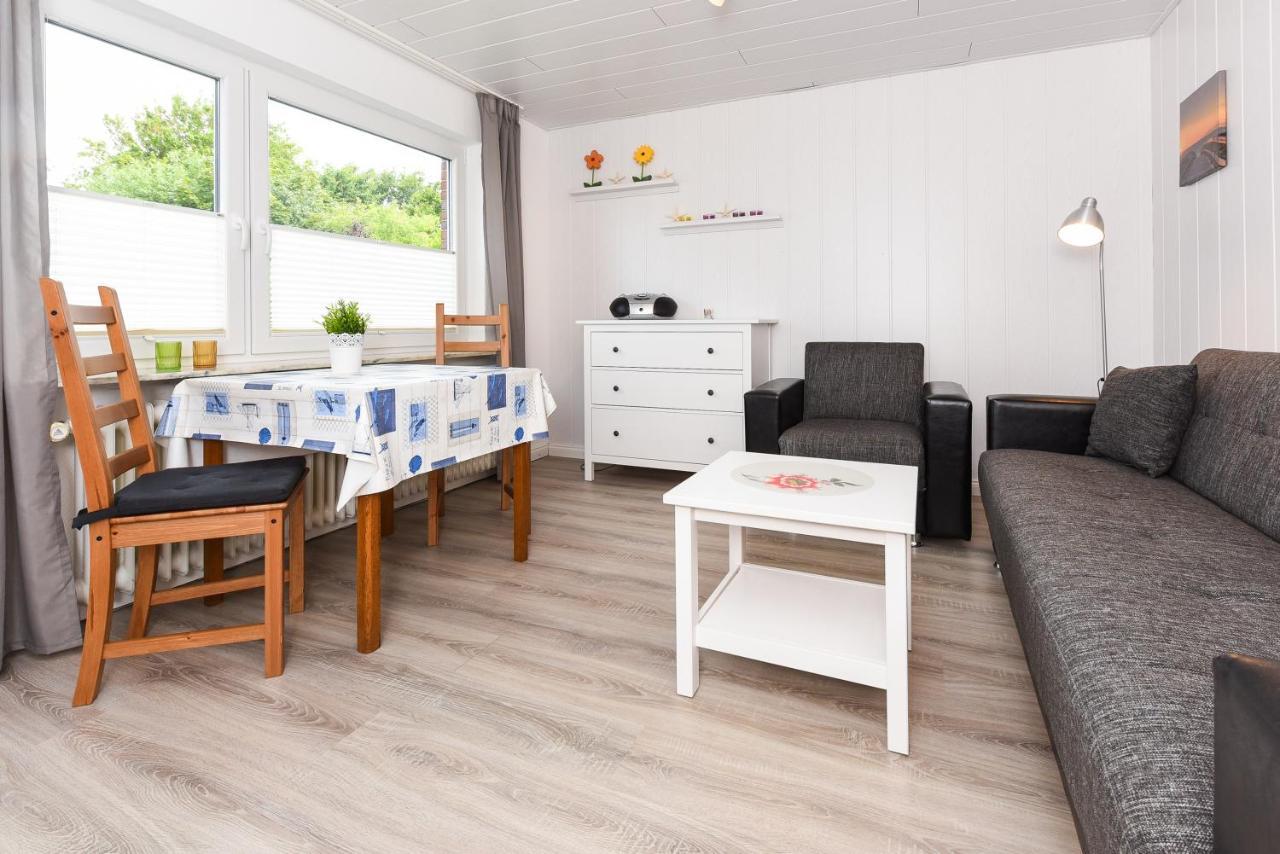Ferienwohnungen Im Haus Waterkant Neuharlingersiel Esterno foto