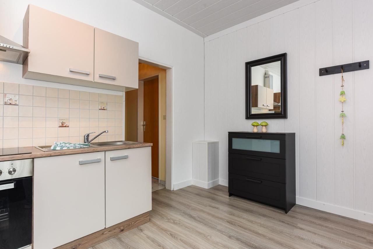 Ferienwohnungen Im Haus Waterkant Neuharlingersiel Esterno foto