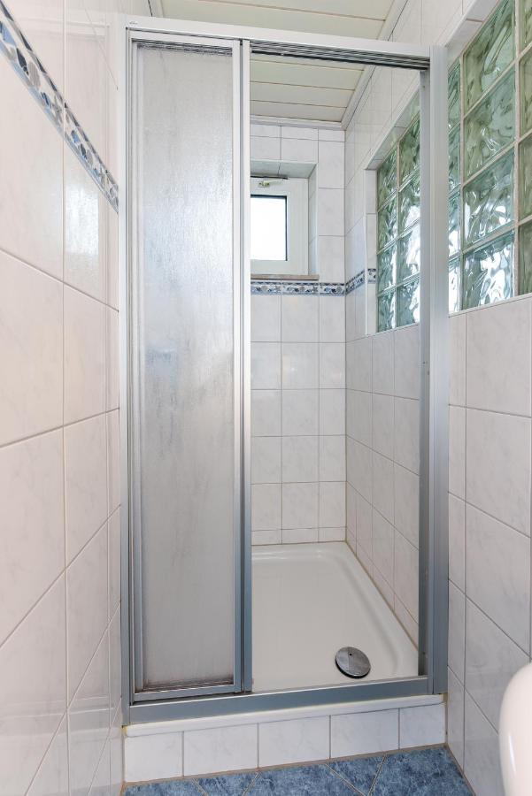 Ferienwohnungen Im Haus Waterkant Neuharlingersiel Esterno foto