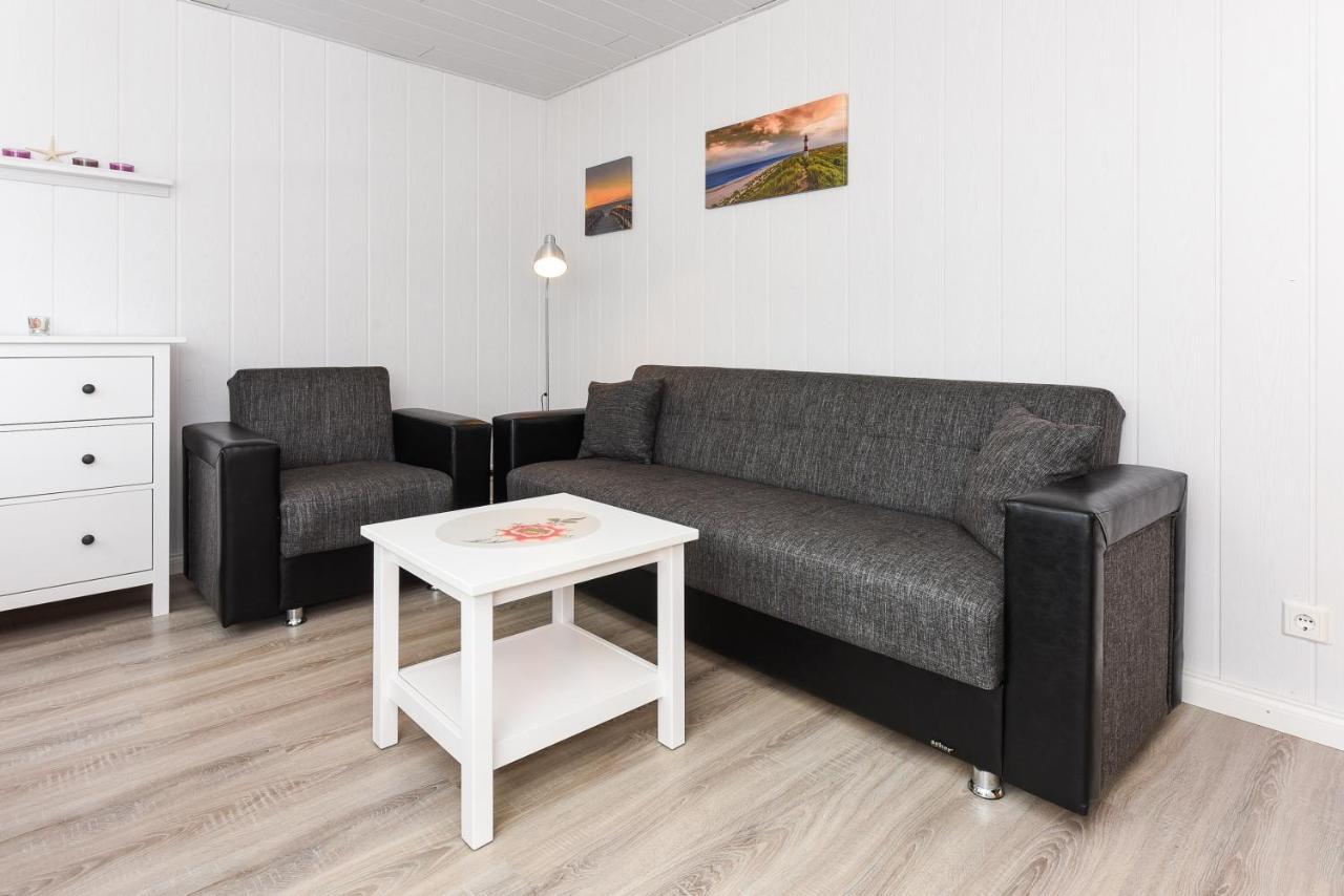 Ferienwohnungen Im Haus Waterkant Neuharlingersiel Esterno foto