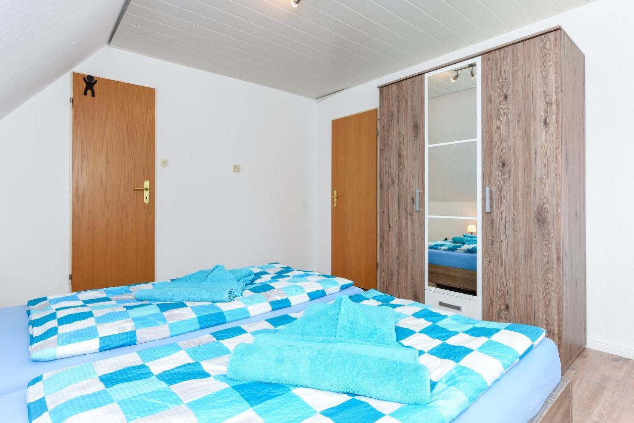 Ferienwohnungen Im Haus Waterkant Neuharlingersiel Esterno foto