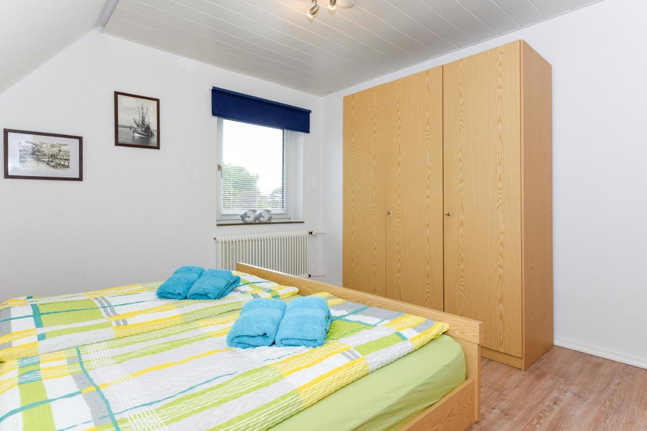 Ferienwohnungen Im Haus Waterkant Neuharlingersiel Esterno foto