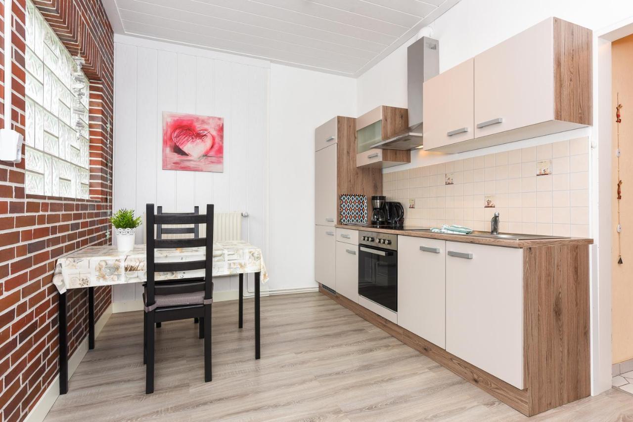 Ferienwohnungen Im Haus Waterkant Neuharlingersiel Esterno foto