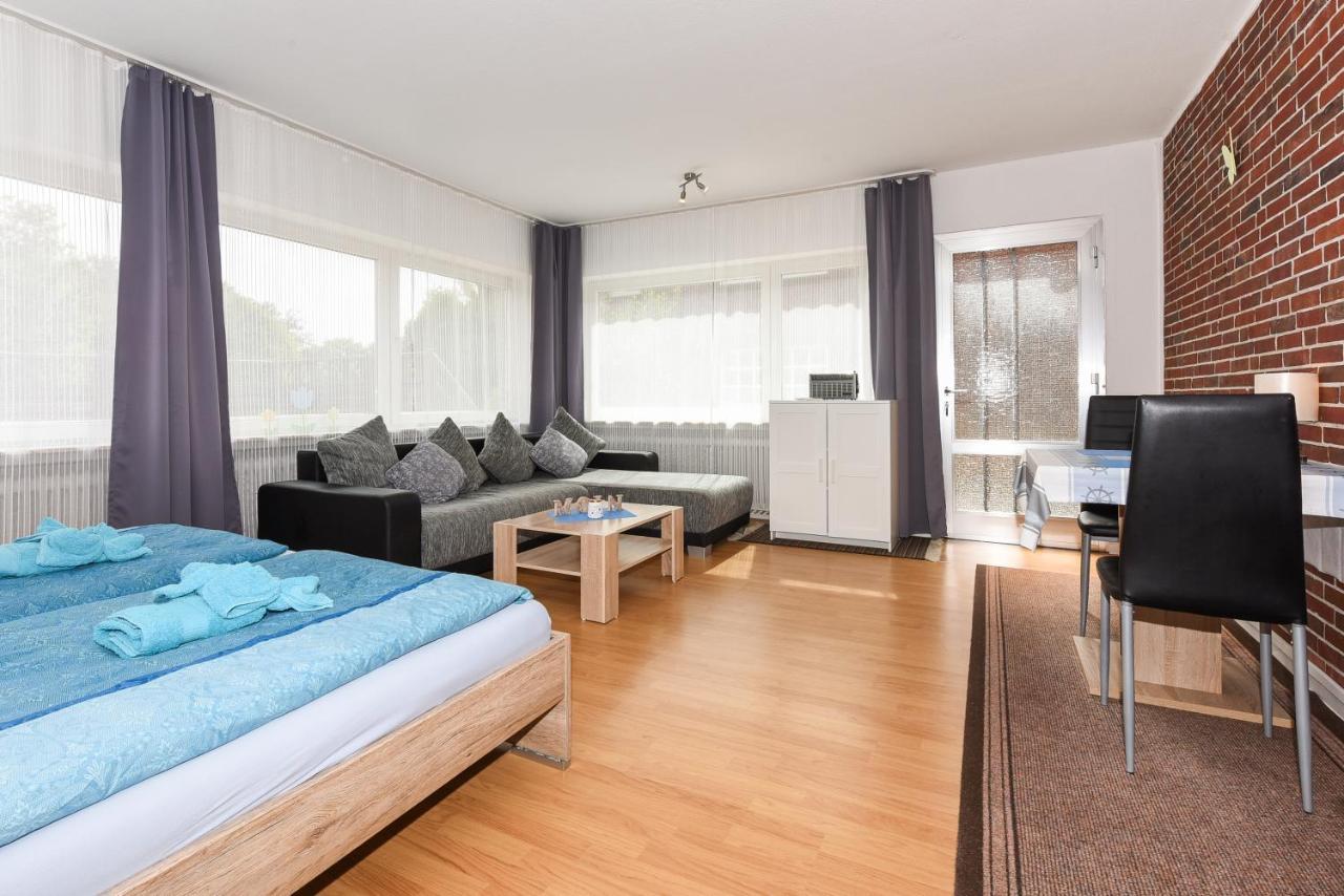 Ferienwohnungen Im Haus Waterkant Neuharlingersiel Esterno foto