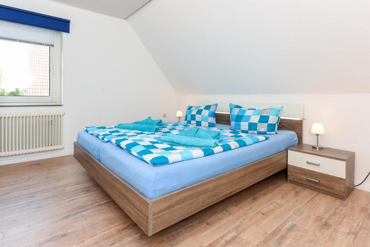 Ferienwohnungen Im Haus Waterkant Neuharlingersiel Esterno foto