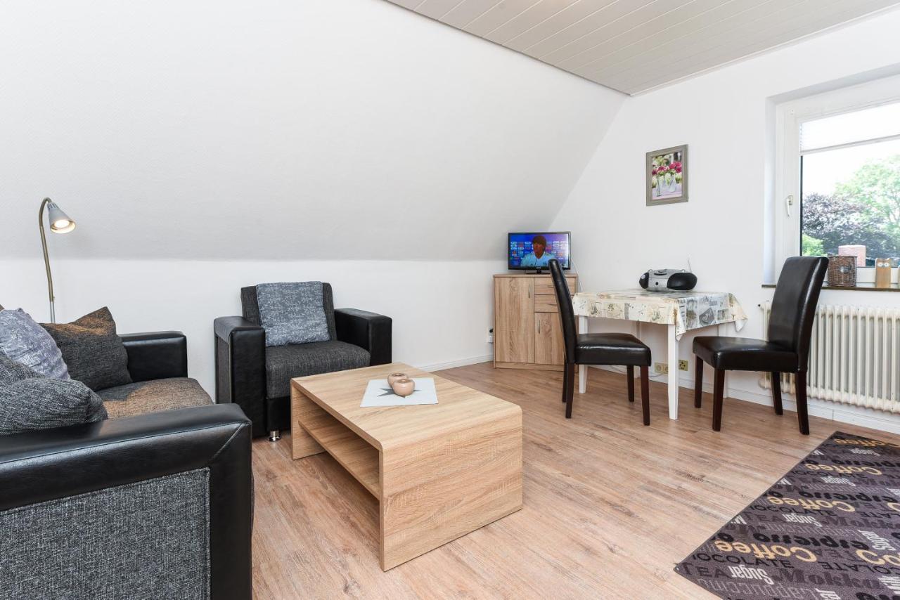 Ferienwohnungen Im Haus Waterkant Neuharlingersiel Esterno foto