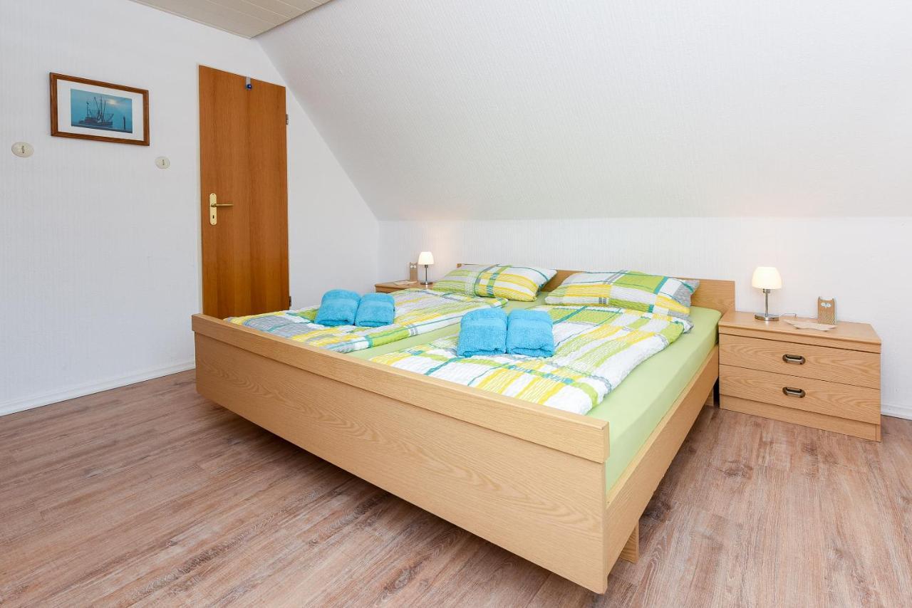 Ferienwohnungen Im Haus Waterkant Neuharlingersiel Esterno foto