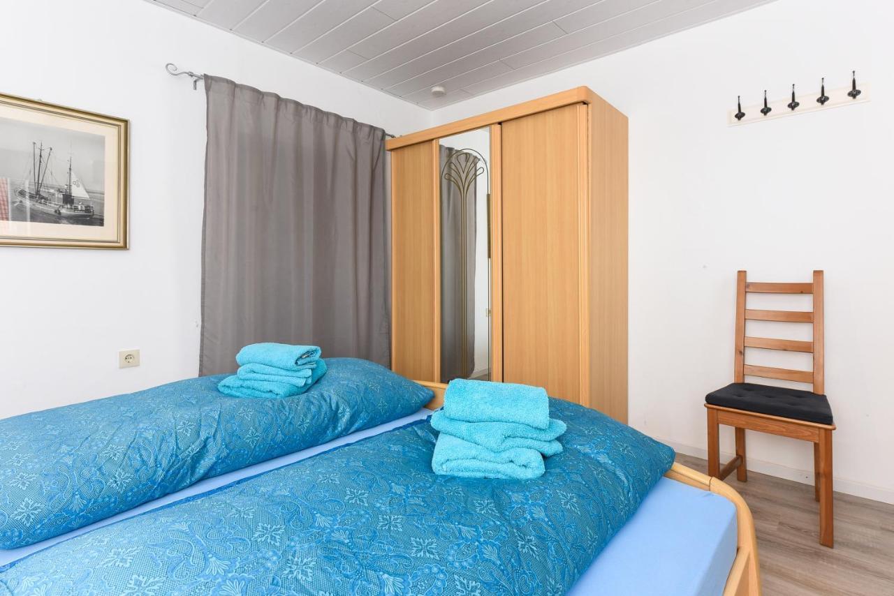 Ferienwohnungen Im Haus Waterkant Neuharlingersiel Esterno foto