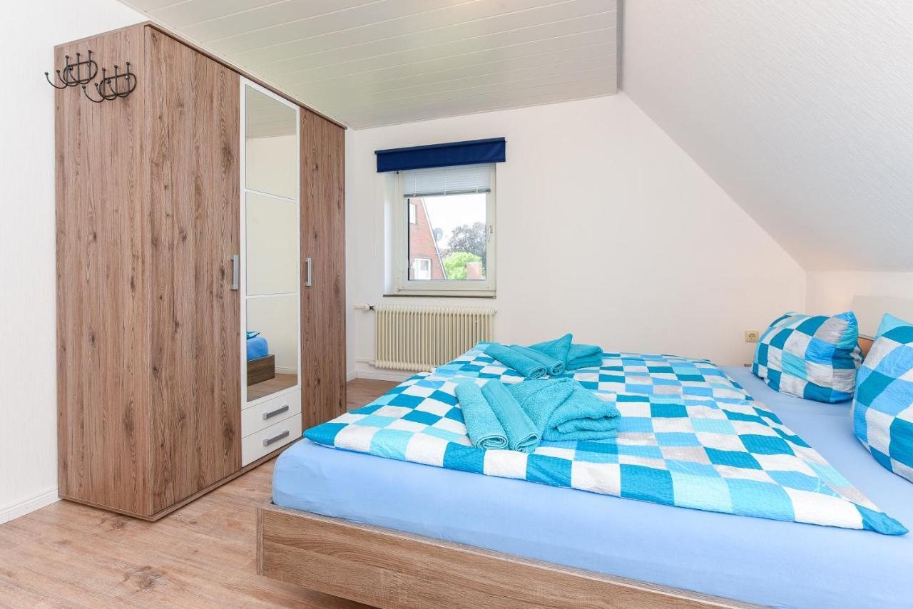 Ferienwohnungen Im Haus Waterkant Neuharlingersiel Esterno foto