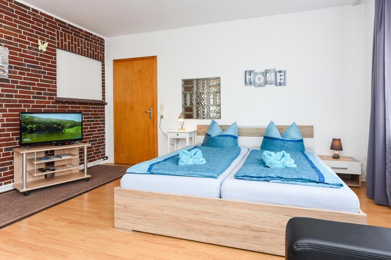 Ferienwohnungen Im Haus Waterkant Neuharlingersiel Esterno foto