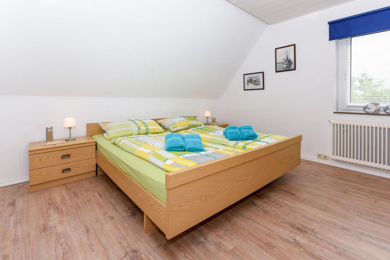 Ferienwohnungen Im Haus Waterkant Neuharlingersiel Esterno foto