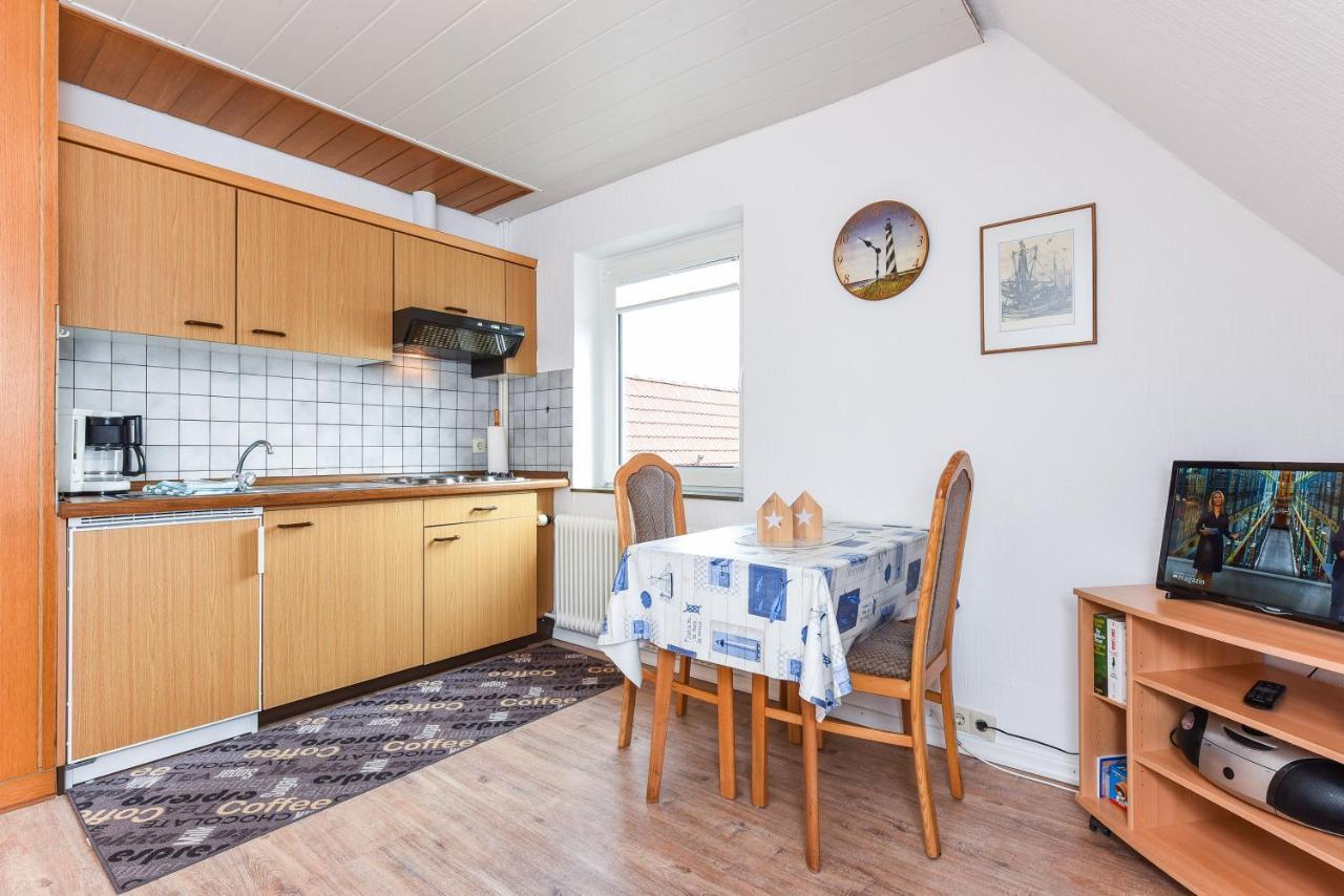 Ferienwohnungen Im Haus Waterkant Neuharlingersiel Esterno foto