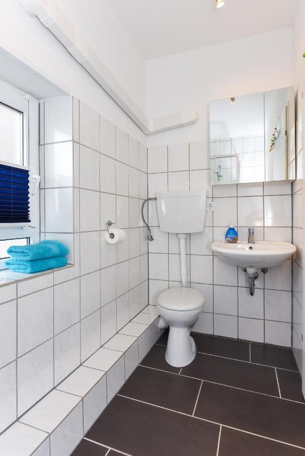 Ferienwohnungen Im Haus Waterkant Neuharlingersiel Esterno foto