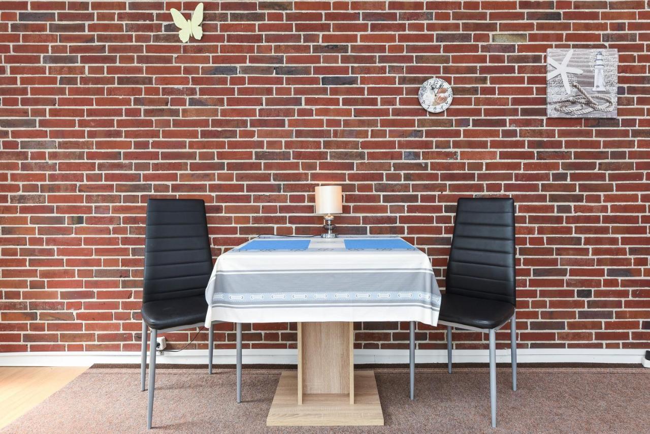 Ferienwohnungen Im Haus Waterkant Neuharlingersiel Esterno foto